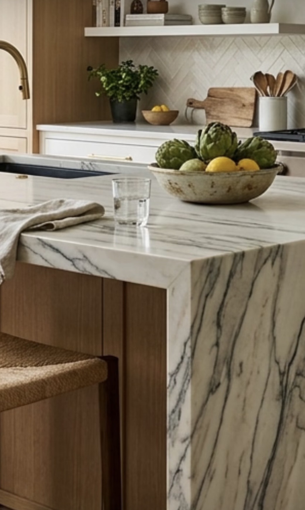 Natural marble surfaces and luxury timber finishes